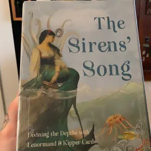 The Siren’s Song: Divining the Depths with Lenormand & Kipper Cards